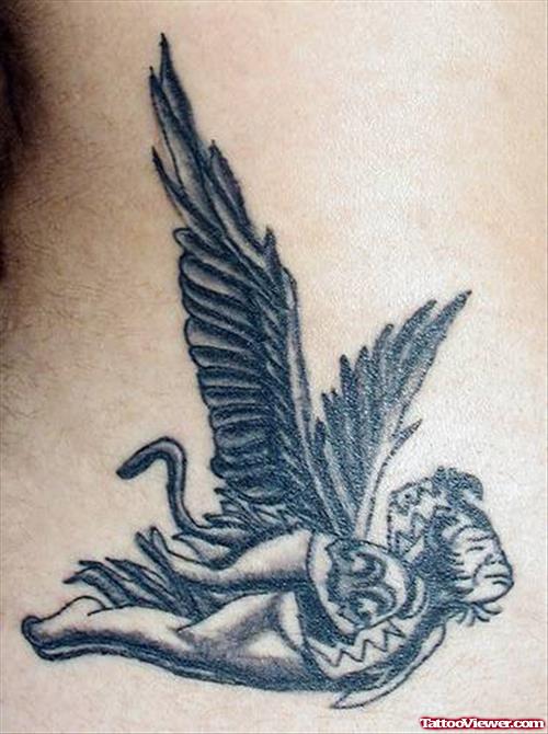 Grey Ink Flying Gothic Tattoo On Lowerback