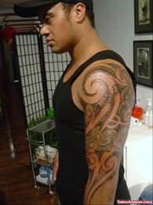 Tribal Gothic Design Tattoo On Arm