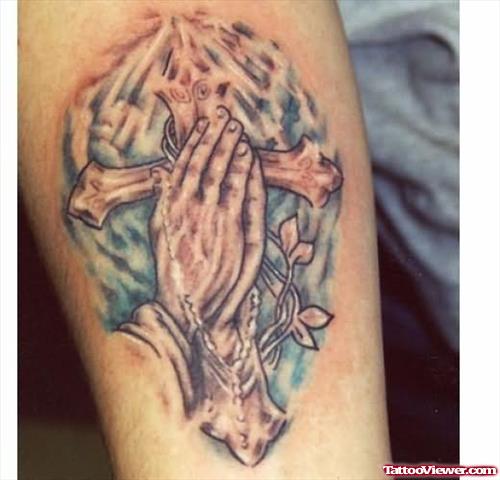 Tribal Cross And Hands Tattoo