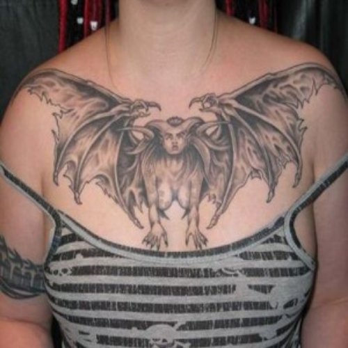 Gothic Tattoo On Girl Chest