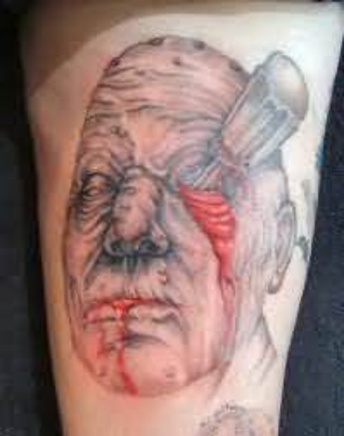 Injured Gothic Face Tattoo