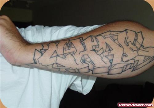 Grey Ink Make Graffiti Tattoo On Arm