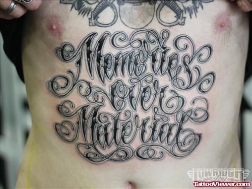 Grey Ink Graffiti Tattoo On Man Stomach