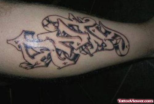 Grey Ink Graffiti Style Tattoo On Sleeve