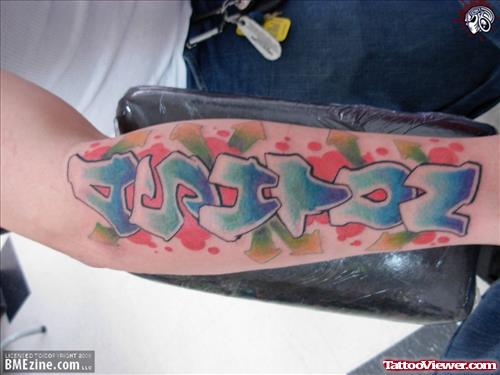 Awesome Blue Ink Graffiti Tattoo On Sleeve