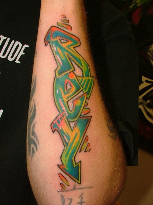 Green Ink Graffiti Tattoo On Left Arm