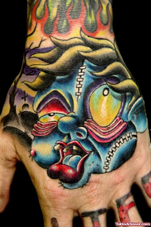 Color Ink Graveyard Tattoo On Left Hand