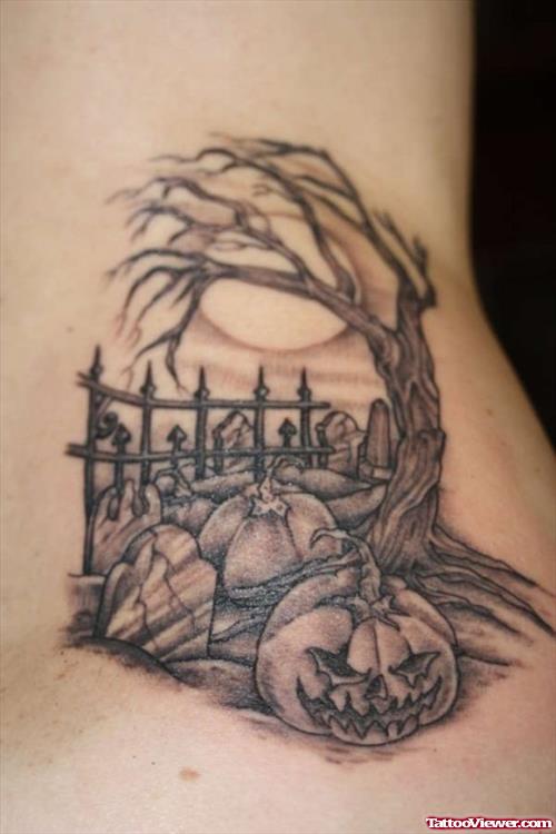Grey Ink Pumpkin Graveyard Tattoo On Lowerback