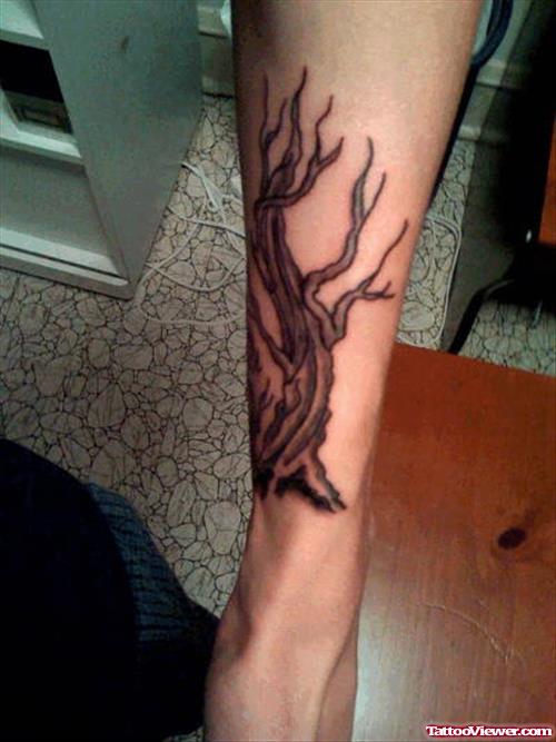 Grey Ink Graveyard Tree Tattoo On Leg