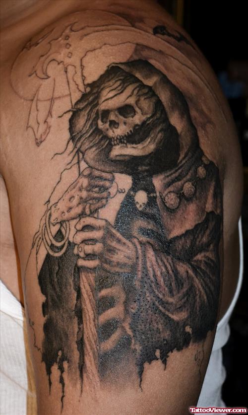 Grey Ink Graveyard Tattoo On Left Half Sleeve