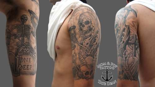 Grey Ink Graveyard Tattoo On Man Left Half Sleeve