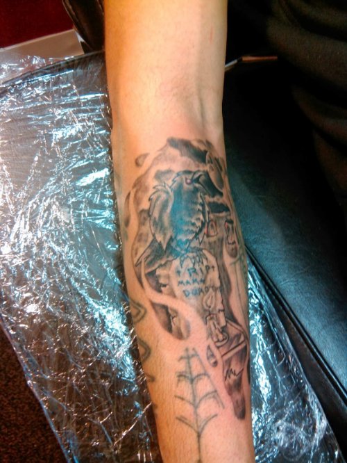 Graveyard Tattoo On Right Arm