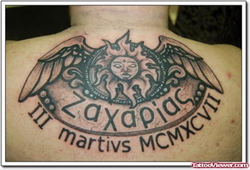 Grey Ink Greek Tattoo On Upperback