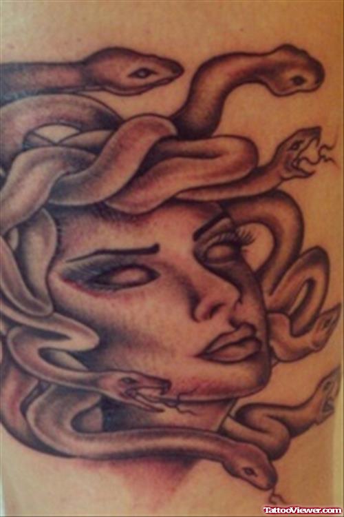 Grey Ink Medusa Head Greek Tattoo
