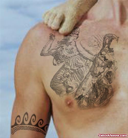 Beautiful Grey Ink Greek Tattoo On Man Chest