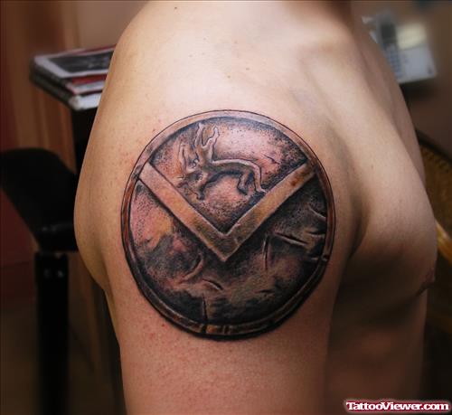 Grey Ink Greek Tattoo On Man Right Shoulder