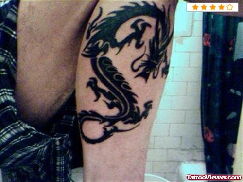 Black Ink Greek Dragon Tattoo On Leg