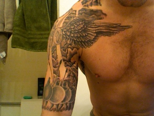Stylish Grey Ink Greek Tattoo On Man Right Half Sleeve