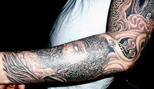Awful Grey Ink Greek Tattoo On Left Sleeve