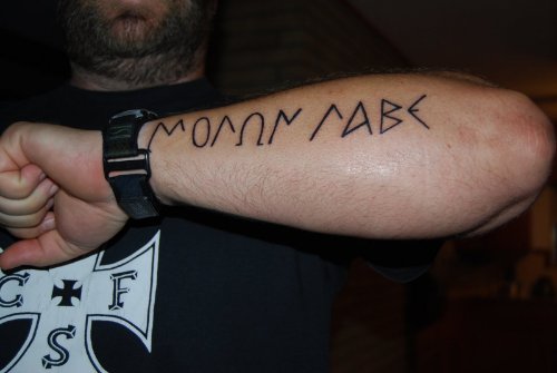 Greek Tattoo On Left Arm