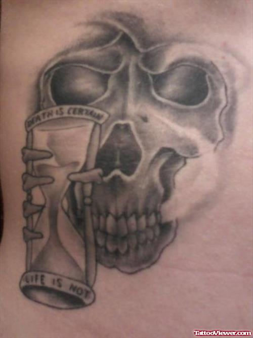 Grey Ink Grim Reaper Skull With Hourglass Tattoo