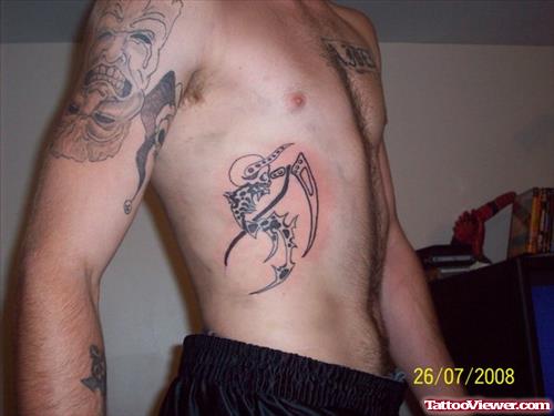 Awesome Black Ink Grim Reaper Tattoo On Side Rib