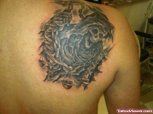 Grey Ink Grim Reaper Tattoo On Right Back Shoulder