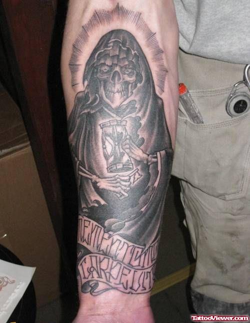 Awesome Black Ink Grim Reaper Tattoo On Right Forearm