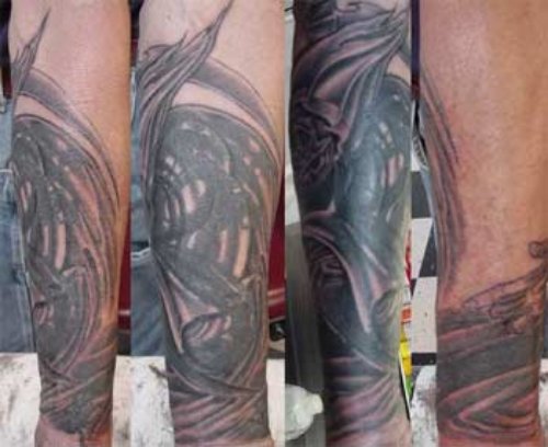 Tribal Grim Reaper Tattoo On Sleeve