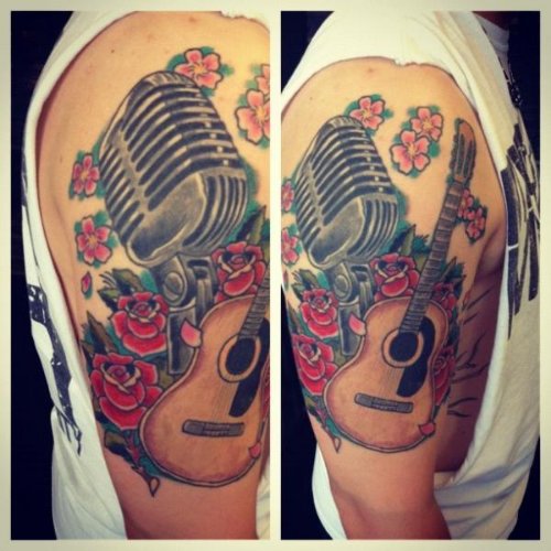 Red Rose Flower And Guitar Tattoo On Right Sleeve