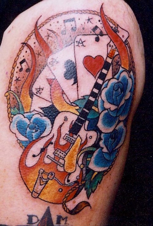 Color Ink Cards And Guitar Tattoo On Half Sleeve