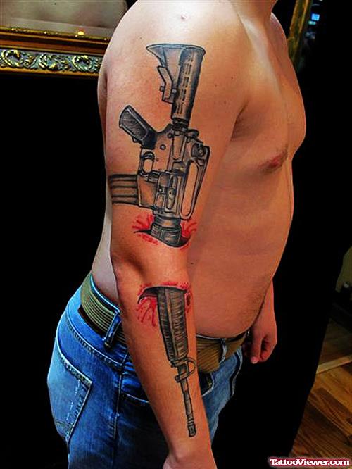 Large Ripped Skin Gun Tattoo On Sleeve