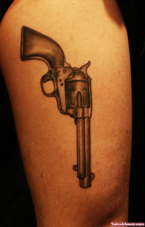 Amazing Grey Ink Gun Tattoo