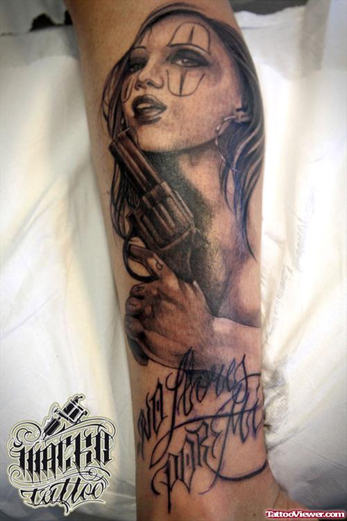 Grey Ink Girl With Gun Tattoo On Arm