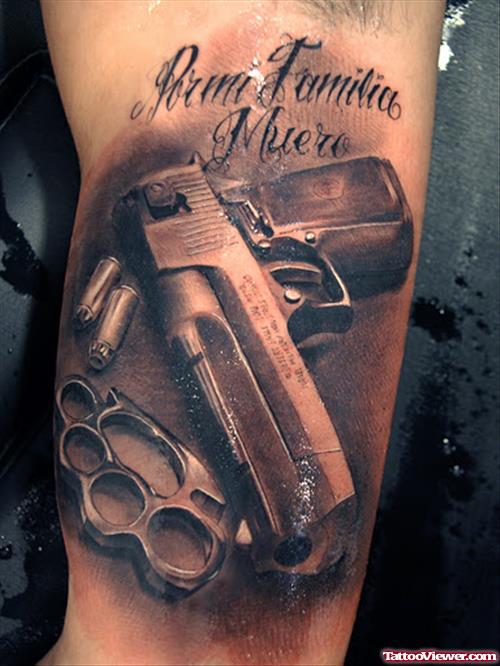Knuckles And Gun Tattoo On Bicep