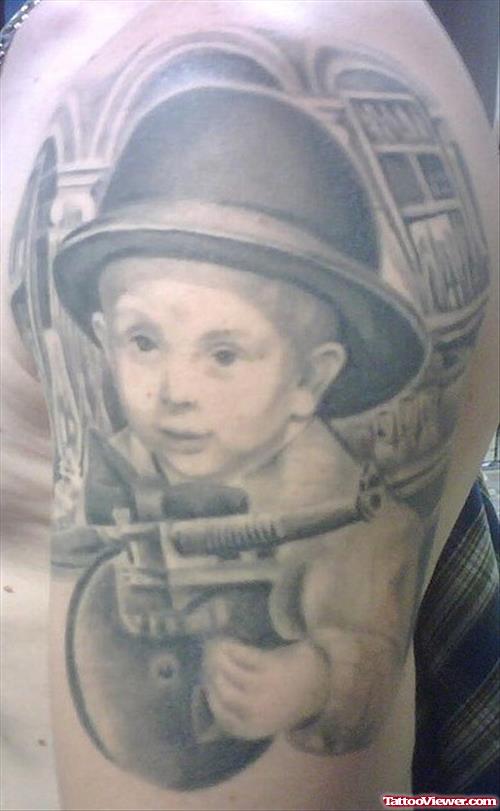 Grey Ink Baby With Gun Tattoo On Right Half Sleeve