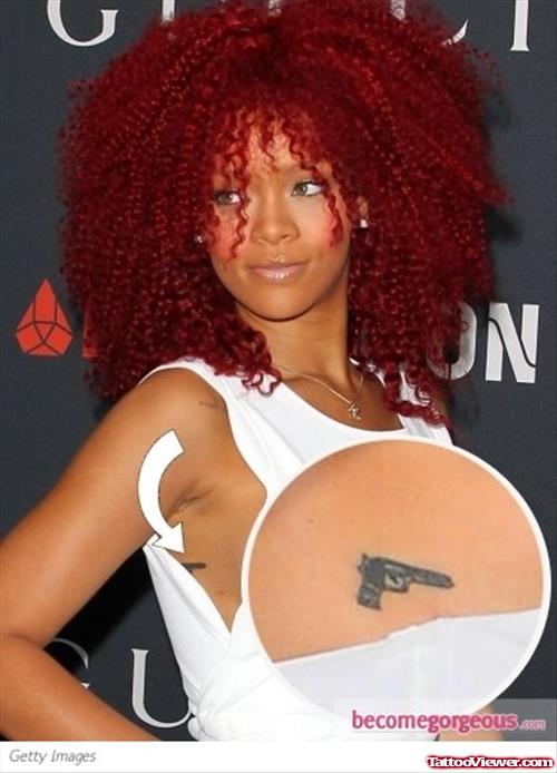 Rihanna Gun Tattoo On Side Rib