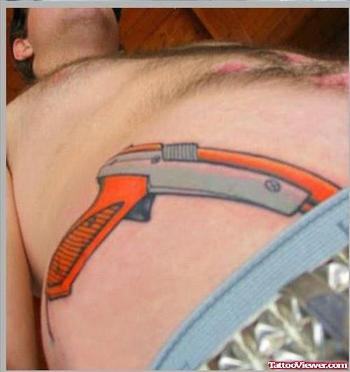 Colored Gun Tattoo On Right Hip