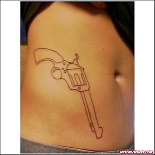 Outline Gun Tattoo On Hip