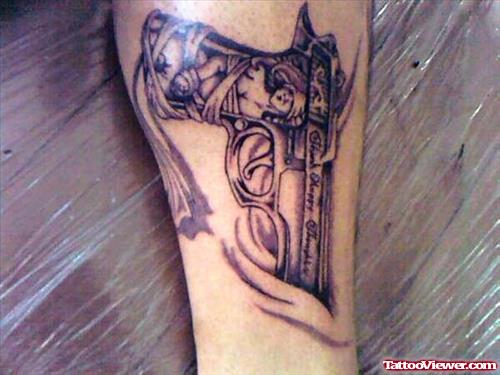 Grey Ink Gun Tattoo On Leg
