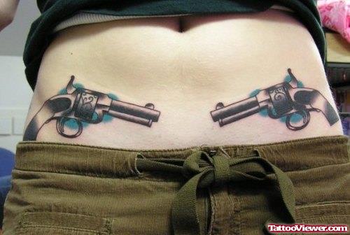 Beautiful Gun Tattoos On Both Hips