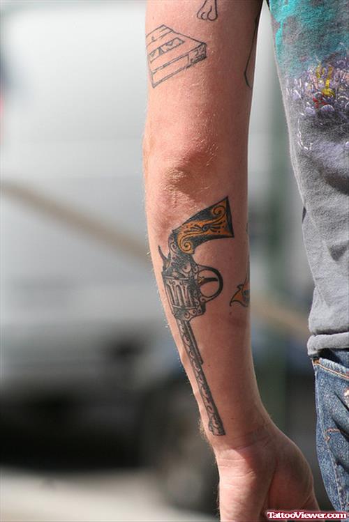 Awesome Gun Tattoo On Left Sleeve