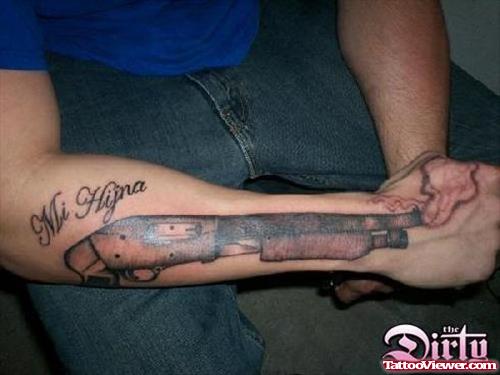 Awesome Grey Ink Gun Tattoo On Right Sleeve