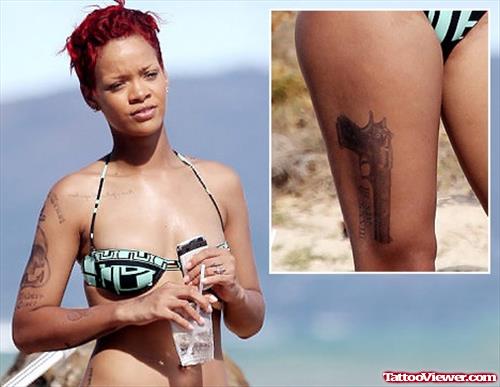 Rihanna With Gun Tattoo On Right Thigh