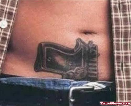 Gun Tattoo On Man Stomach