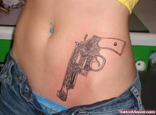 Gun Tattoo On Girl Waist