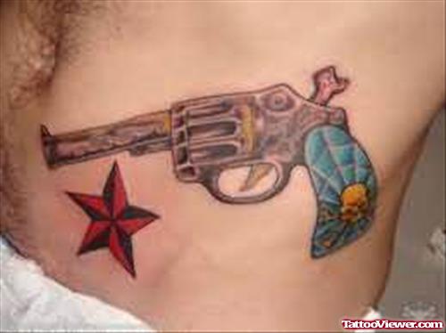 Colourful Star And Gun Tattoo