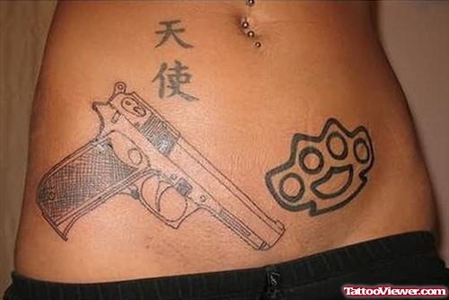 Gun  Waist Tattoo