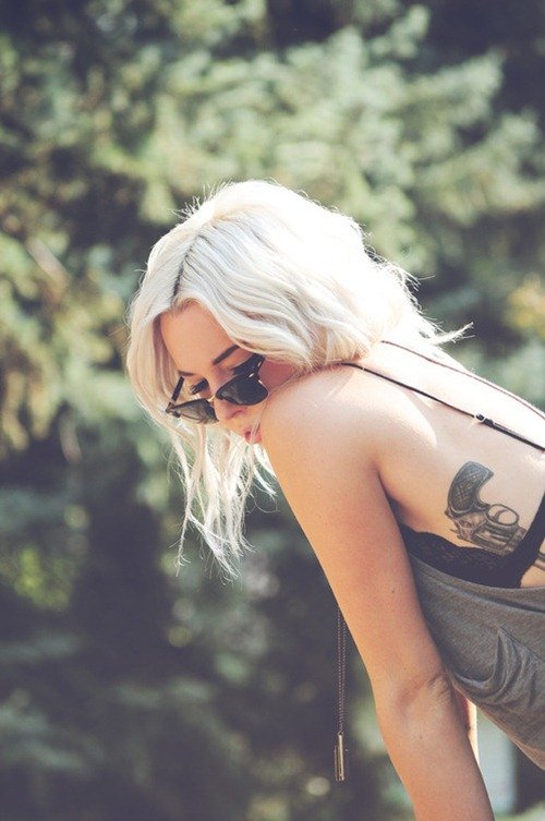 Grey Ink Cool Gun Tattoo On Girl Rib Side