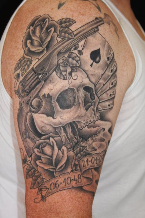 Grey Ink Skull And Gun Tattoo On Right Half Sleeve